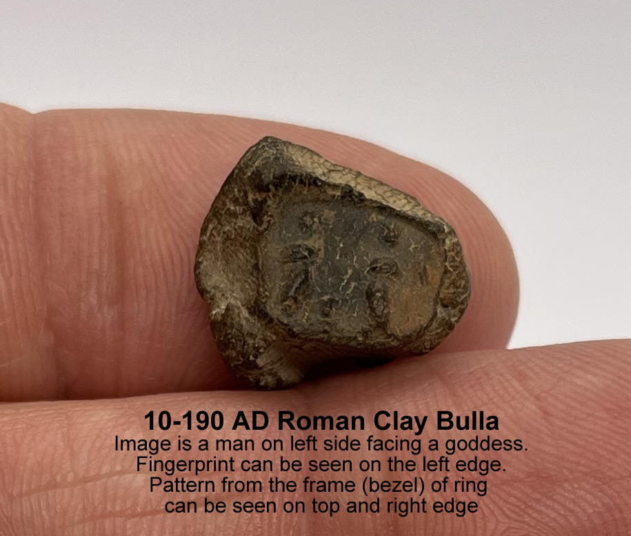 10 190 AD Roman Clay Bulla obverse man standing on left facing goddess
