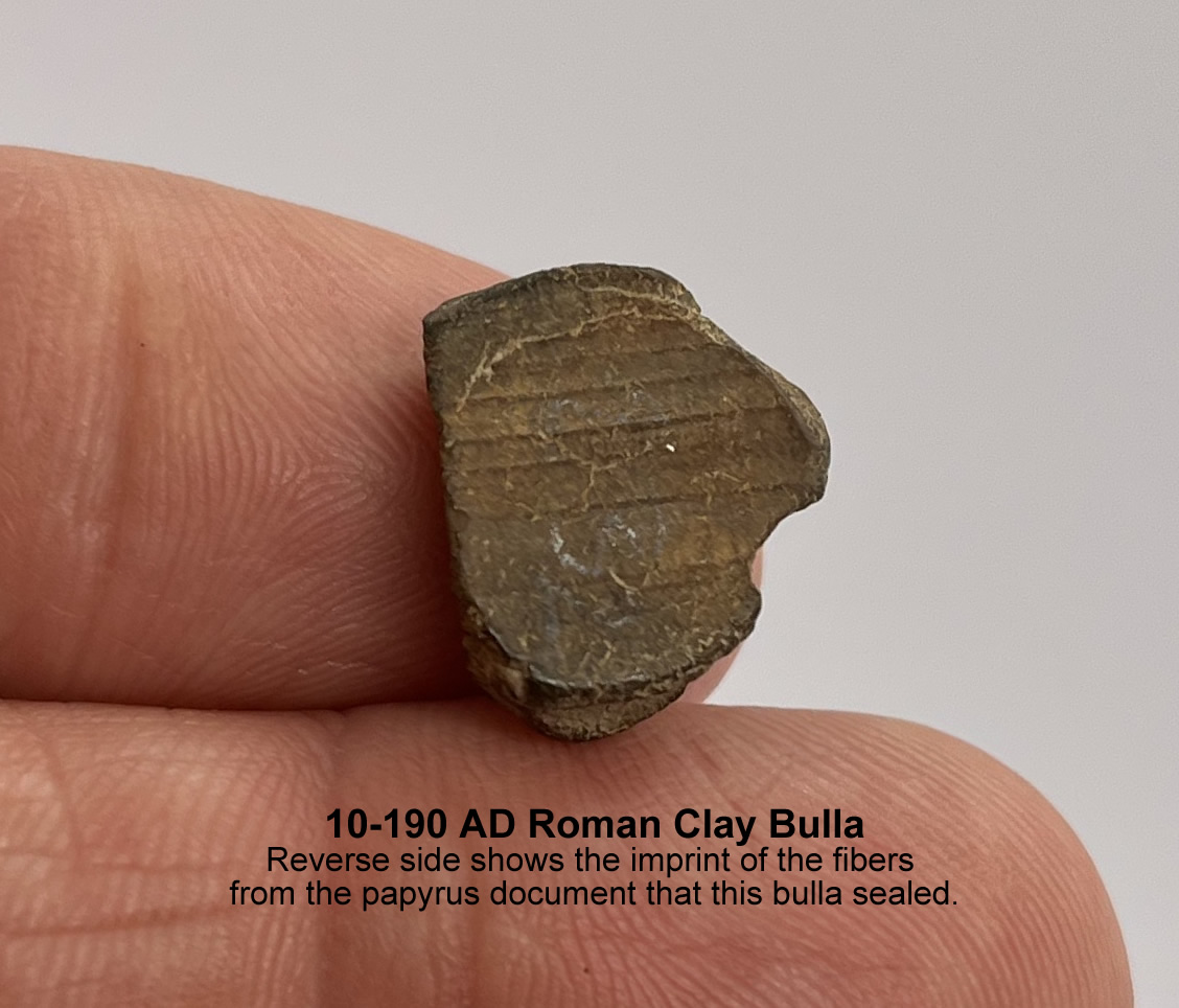 10 190 AD Roman Clay Bulla reverse shows papyrus fibers of document