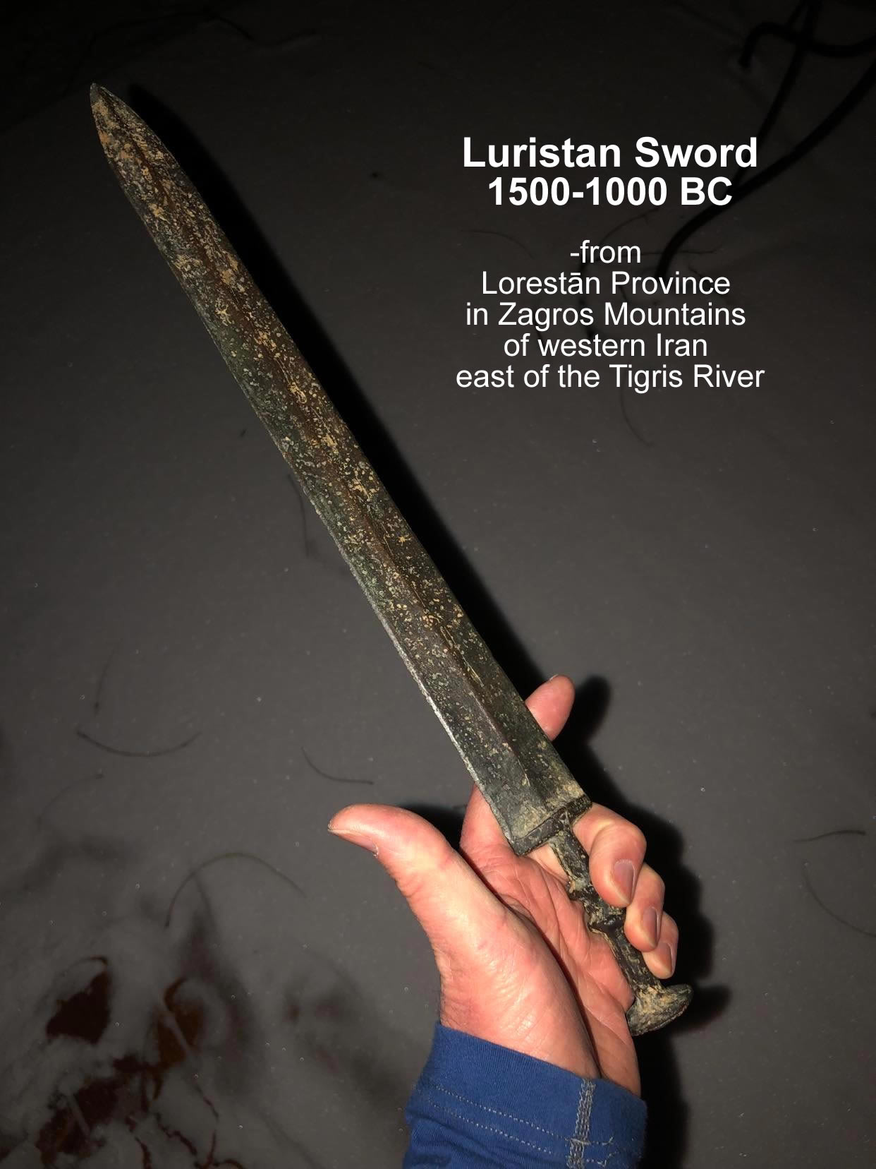 1600 1000 BC Luristan Sword cast bronze held in hand